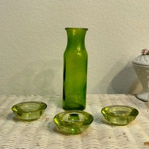 Green glass vase and candle holders